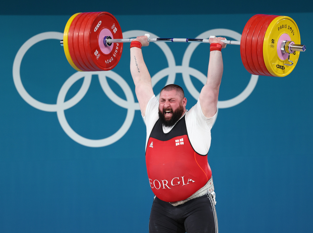 关于格鲁吉亚冠军在拳击赛场上表现出色的信息